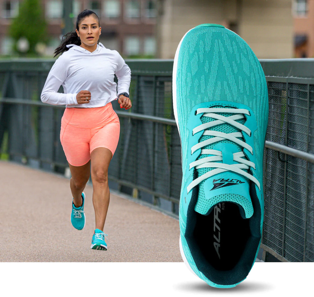 woman running with mint shoes